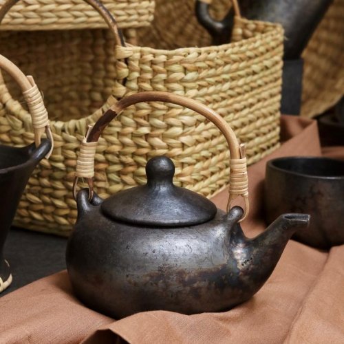 Handcrafted Longpi pottery and bamboo weaving from Manipur, blending black serpentine stone and clay with sustainable artistry; Image credits: Bamboopecker