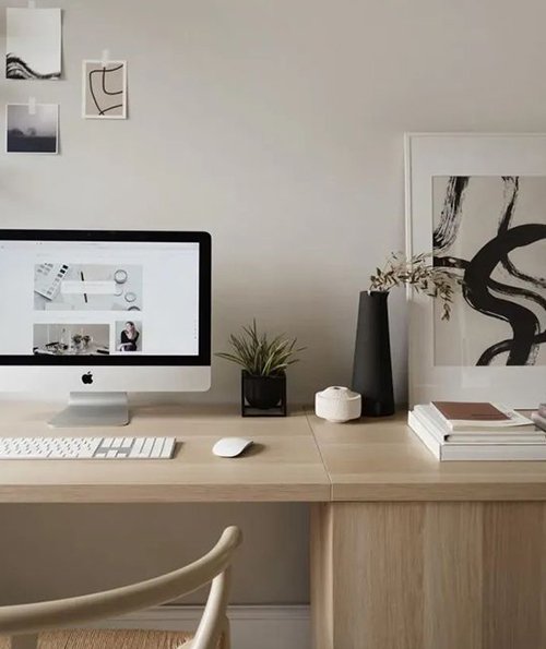 Decluttering and organizing your workspace fosters calm and clarity for enhanced productivity; Image Credits: Abbi Dare