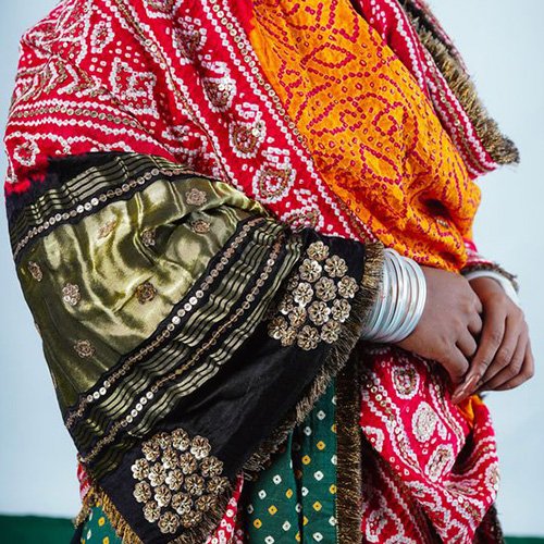 Bandhani fabrics, often seen in sarees, turbans, and dupattas, are dyed in bright, bold colors that reflect the spirit of the region; Image credits: Ayush Kejriwal